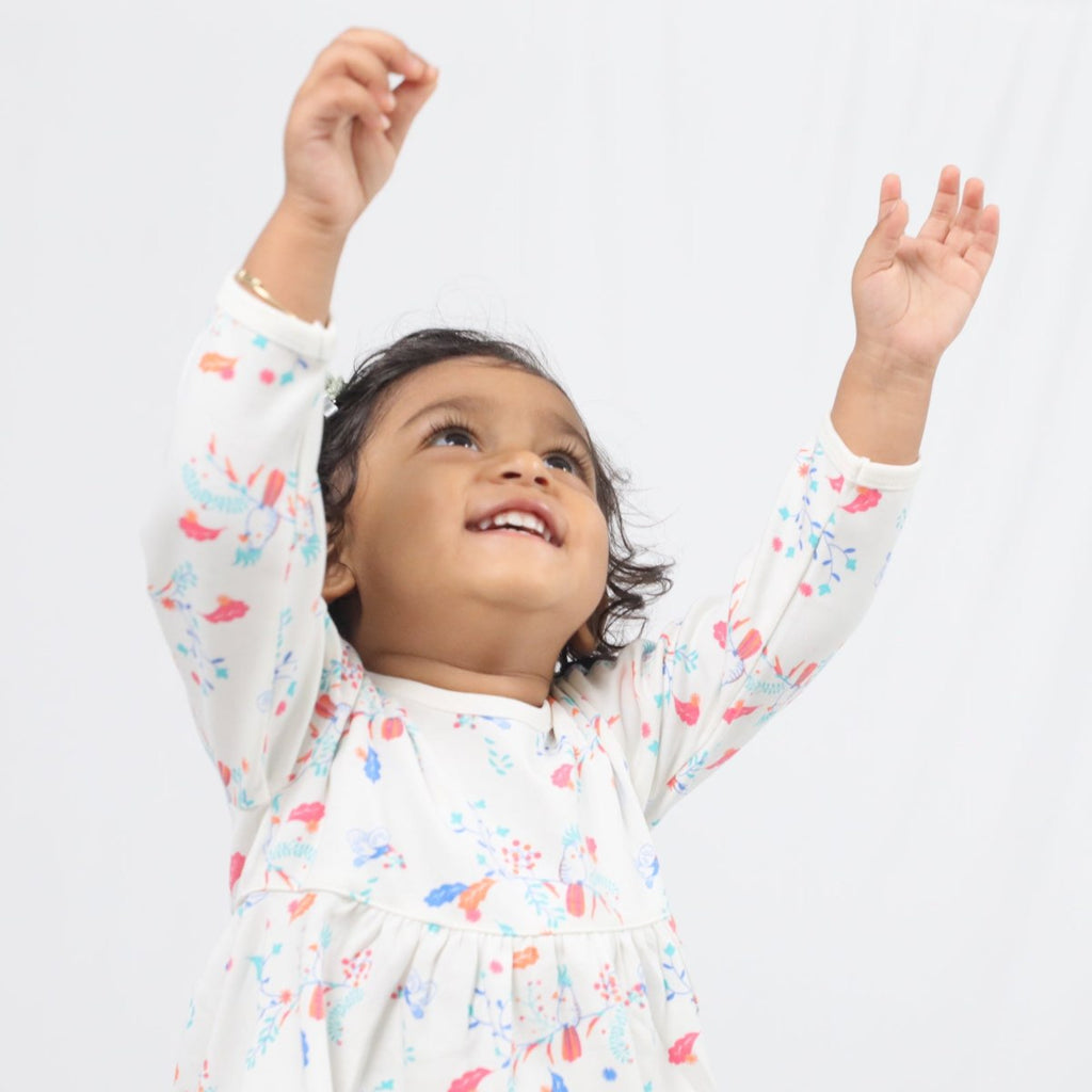 Baby in Tiny Twig organic cotton