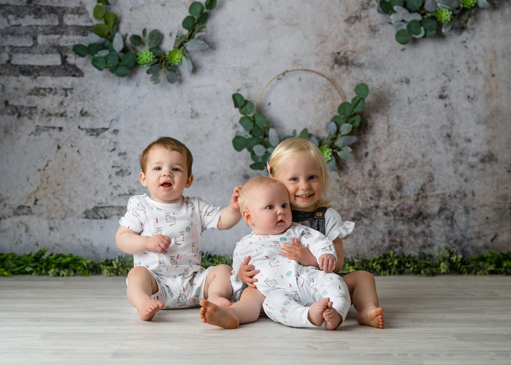 Baby in a Tiny Twig organic cotton diagonal zipsuit